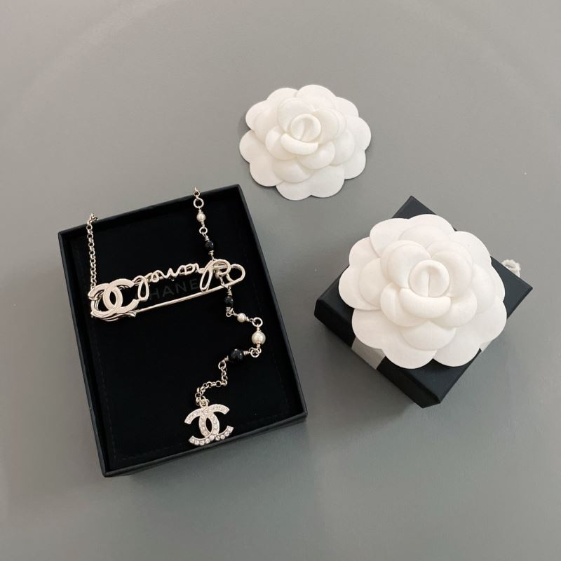 Ch*el brooches